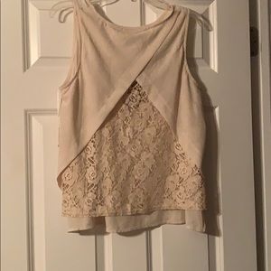 Cream top with peakaboo split back with lace